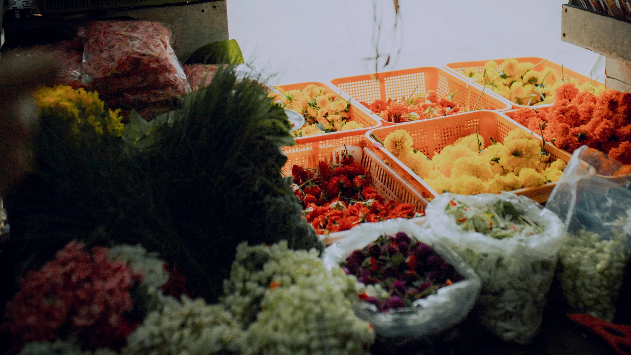 a bunch of baskets filled with different types of flowers, unsplash, hurufiyya, with street food stalls, avatar image, atmospheric photo