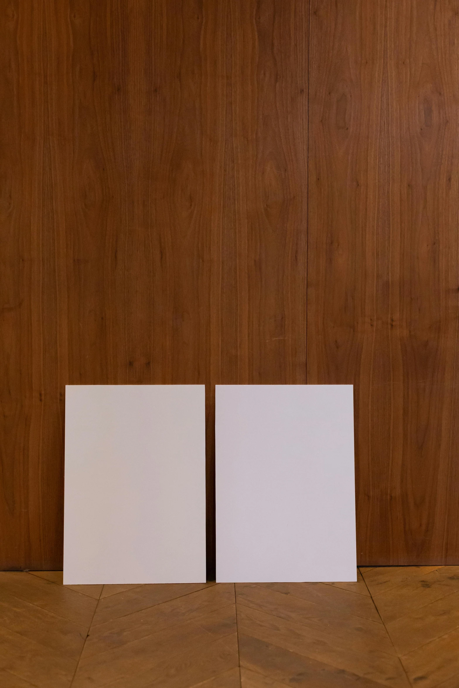 a couple of white boxes sitting on top of a wooden floor, a minimalist painting, by Harvey Quaytman, unsplash, wood panel walls, 100lb cardstock, diptych, 8 k -