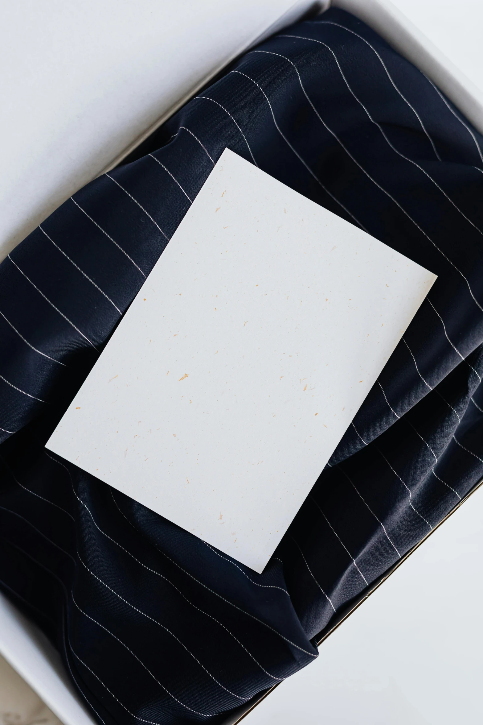 a box that has a piece of paper in it, unsplash, private press, lined in cotton, elegantly dressed, orange, thin lines