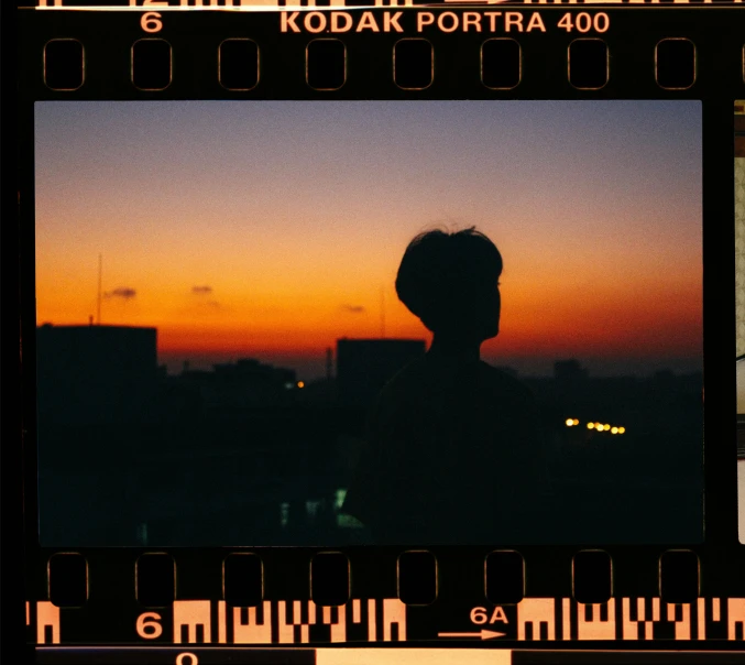 a close up of a person standing in front of a camera, inspired by Elsa Bleda, happening, watching the sun set. anime, color kodak, 268435456k film, instagram post