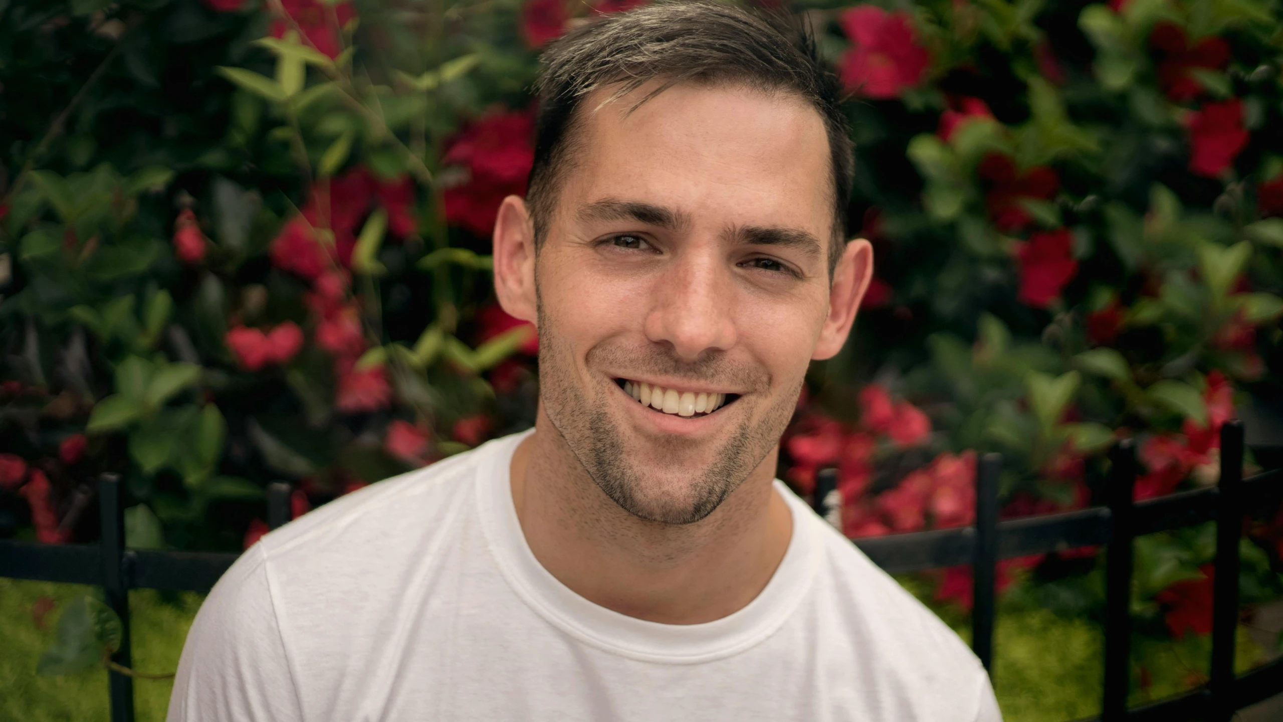 a man in a white shirt posing for a picture, zachary corzine, profile image, classified photo, outdoor photo