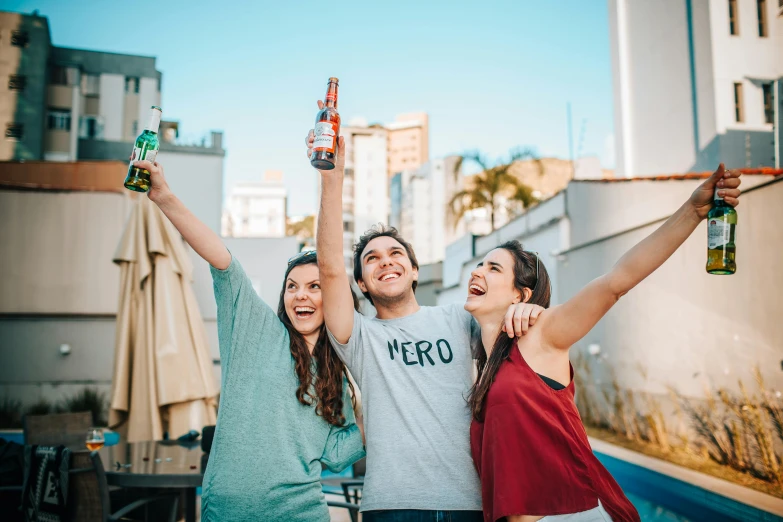 a group of young people standing next to each other, pexels contest winner, happening, rooftop party, avatar image, beer, in sao paulo