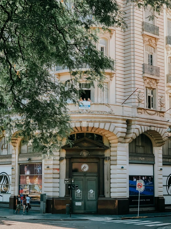 a tall building sitting on the side of a street, a photo, pexels contest winner, art nouveau, 2 5 6 x 2 5 6 pixels, panorama view, shop front, budapest