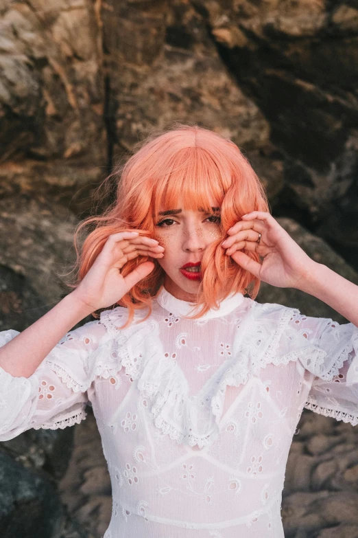 a woman with pink hair wearing a white dress, trending on pexels, orange rocks, whitebangs, amouranth, jamie coreth