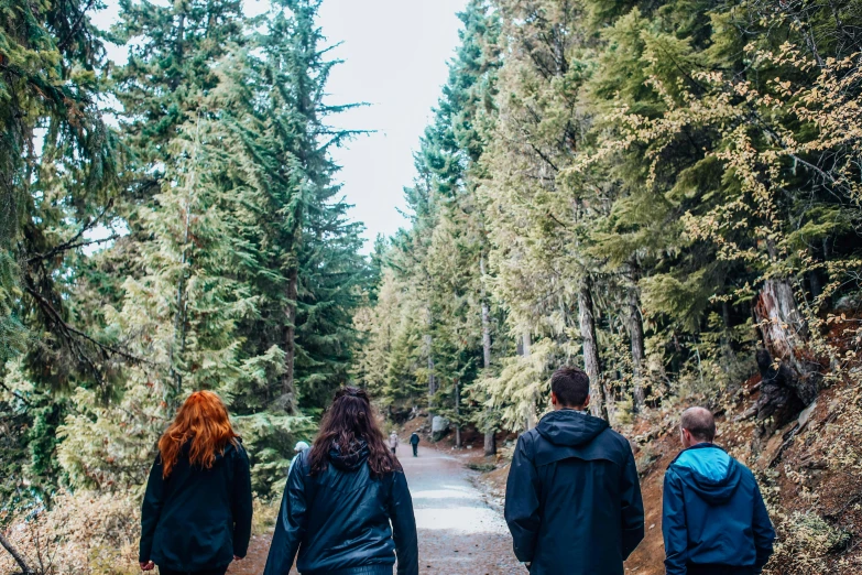 a group of people walking down a dirt road, black fir, millennial vibes, profile image, thumbnail