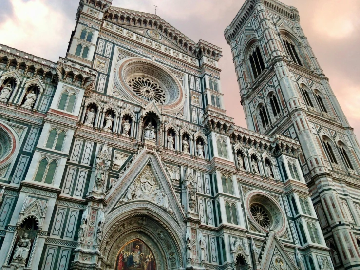 a very tall building with a clock on it's side, a photo, inspired by Giotto, pexels contest winner, renaissance, pink arches, evening light, square, gray