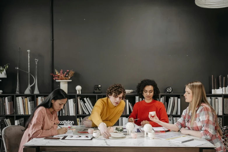 a group of people sitting around a table, pexels contest winner, academic art, product design shot, casually dressed, artststion, 1 2 9 7