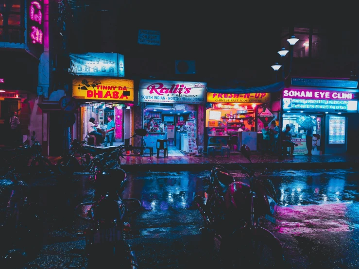 a city street at night with neon signs, pexels contest winner, convenience store, in sci - fi mumbai, rain aesthetic, purple and blue neons