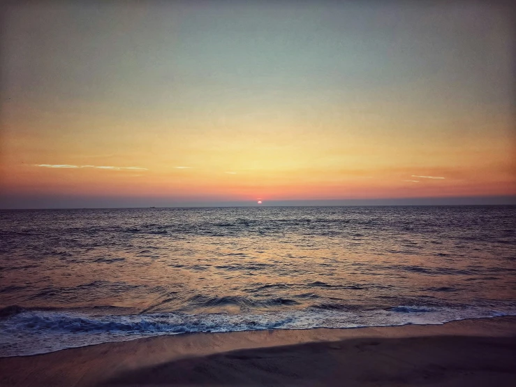 the sun is setting over the ocean on the beach, an album cover, pexels contest winner, minimalism, 2 5 6 x 2 5 6 pixels, iphone picture, southern california, view of sea