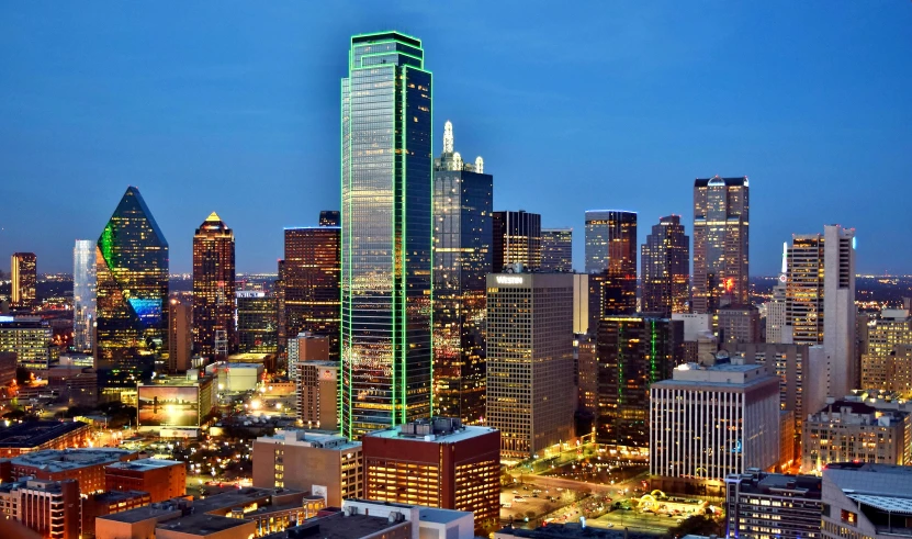 a view of a city at night from the top of a building, jr ewing from dallas, slide show, fan favorite, green glows