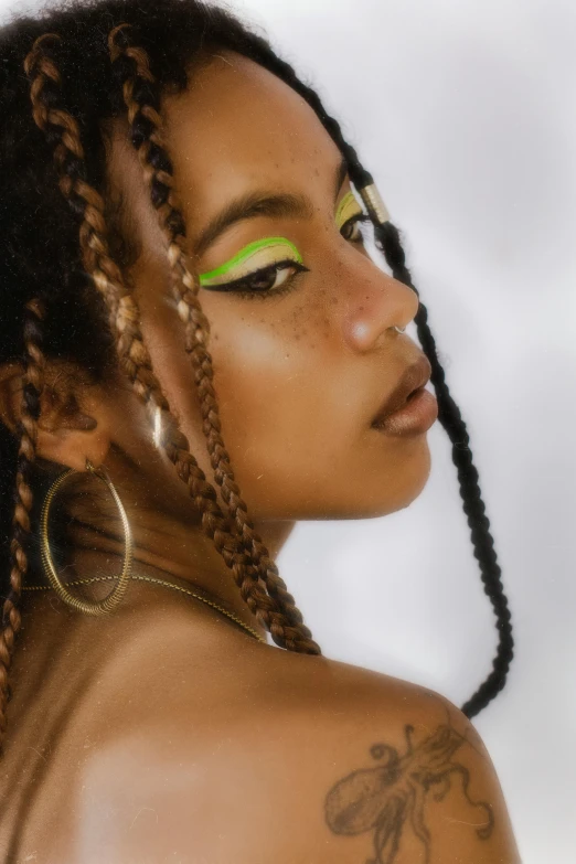 a close up of a person with long hair, by Dulah Marie Evans, trending on pexels, afrofuturism, girl with plaits, lime green, sparse freckles, traditional makeup