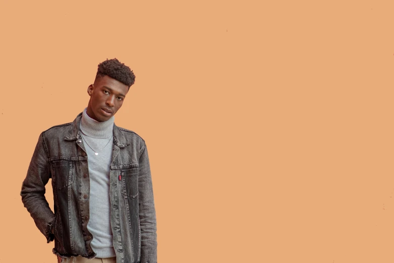 a man standing with his hands in his pockets, an album cover, trending on pexels, hyperrealism, ( brown skin ), orange hue, male teenager, pastel'