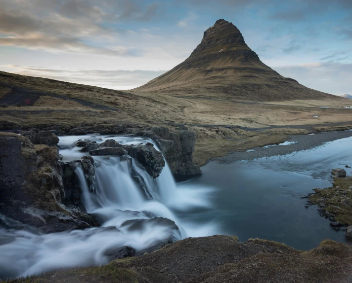 a waterfall with a mountain in the background, by Hallsteinn Sigurðsson, unsplash contest winner, renaissance, pools of water, 2022 photograph, medium format, medium format photography