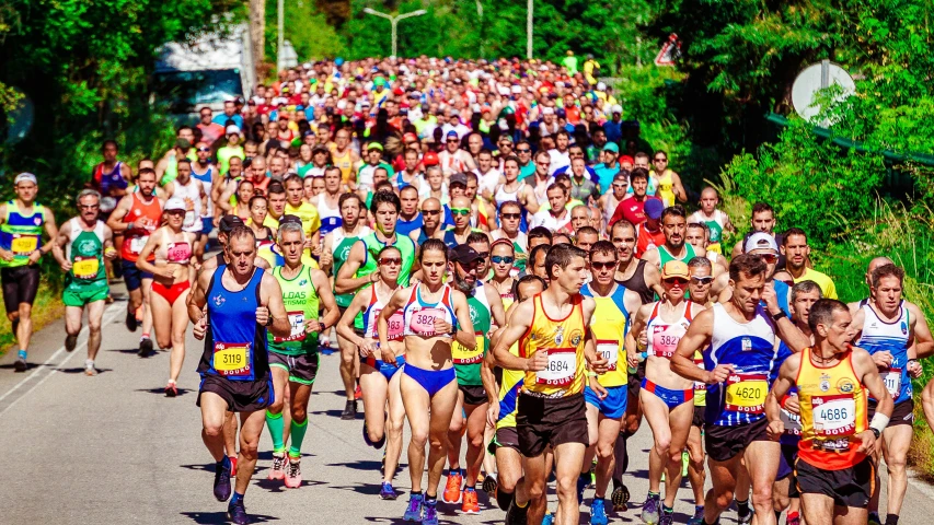 a large group of people running in a marathon, by Matija Jama, shutterstock, costa blanca, avatar image, romanian, leaked image