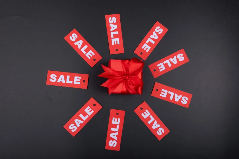 sale tags with a red bow on a black background, by Samuel Scott, pexels contest winner, happening, multi-part, wide overhead shot, a small, 8 h