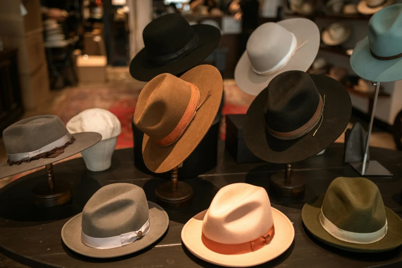a bunch of hats sitting on top of a table, product display, manly, thumbnail, carrington