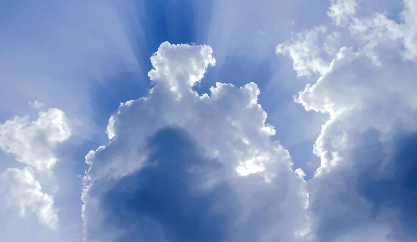 a plane flying through a cloudy blue sky, by Jan Rustem, unsplash, god's rays highly detailed, ceremonial clouds, smiling in heaven, silver lining