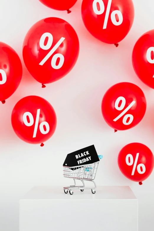 a shopping cart sitting on top of a pile of red balloons, curated collections, - 8, thumbnail