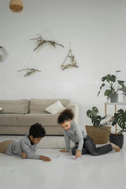 two children playing on the floor in a living room, a child's drawing, pexels contest winner, modern earthy neutral earthy, plants, ready to model, promotional image