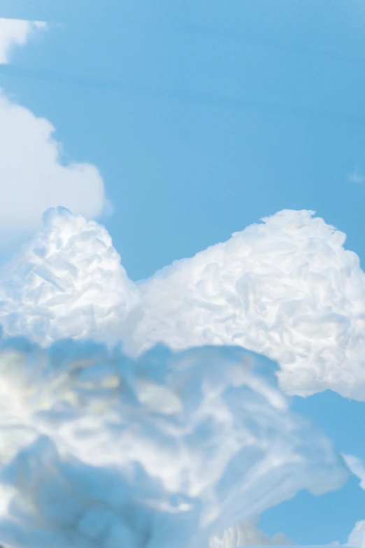 a jetliner flying through a cloudy blue sky, an album cover, unsplash, plasticien, close up of single sugar crystal, in style of photogrammetry cloud, lots of white cotton, avatar image