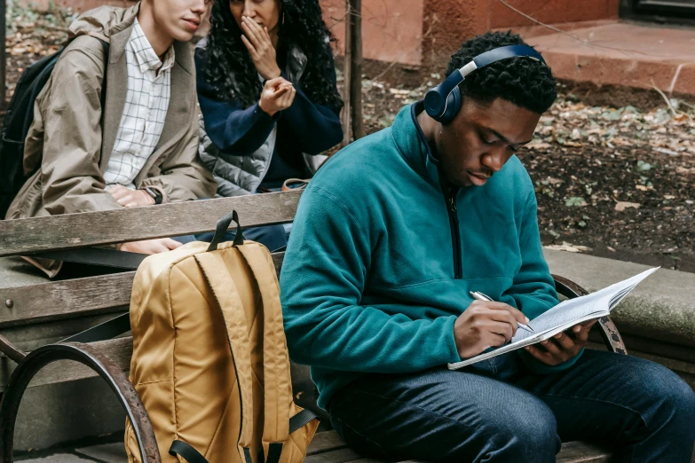 a group of people sitting on top of a wooden bench, pexels contest winner, academic art, with head phones, writing on a clipboard, j. h. williams iii, full subject shown in photo