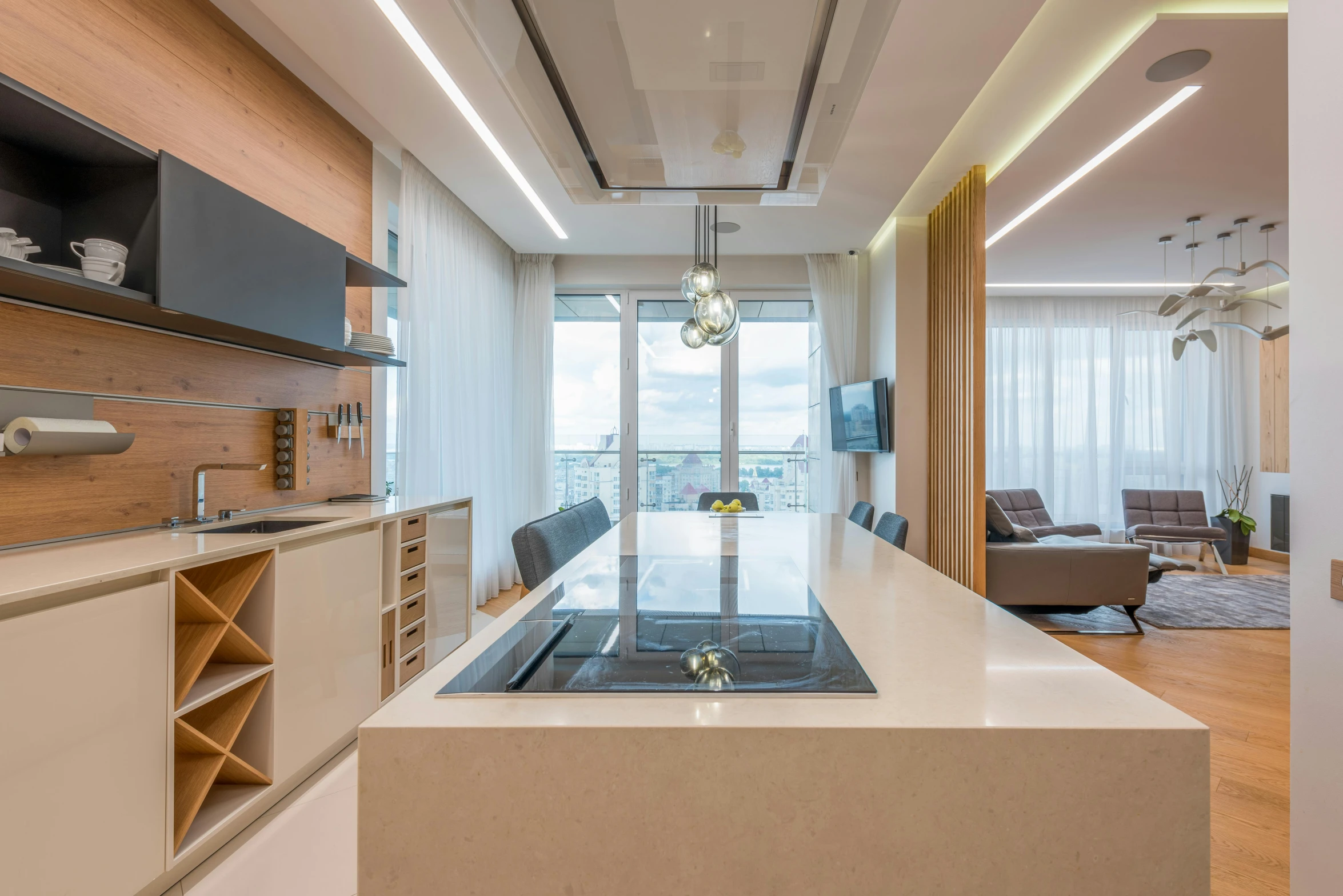 a kitchen with a stove top oven sitting on top of a counter, by Adam Marczyński, unsplash, light and space, suspended ceiling, inside a modern apartment, panorama view, cream - colored room