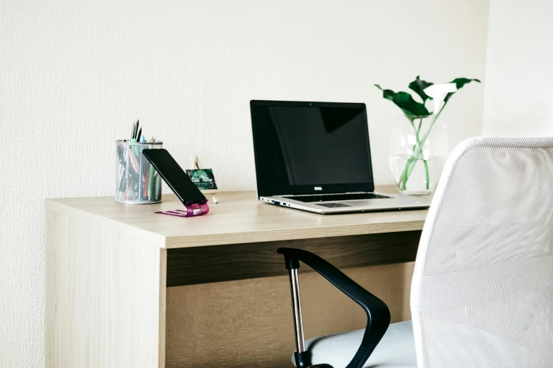 a laptop computer sitting on top of a wooden desk, white table, dwell, design only, online