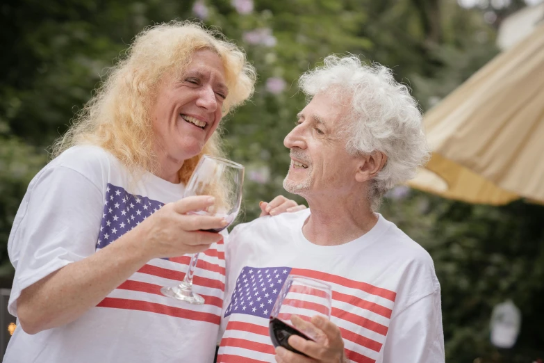 a couple of women standing next to each other holding wine glasses, by Harriet Zeitlin, pexels contest winner, uncle sam, curly white hair, wearing a tee shirt and combats, avatar image