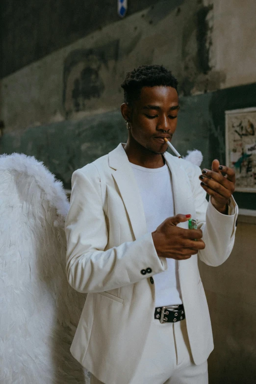 a man in a white suit smoking a cigarette, by Cosmo Alexander, pexels contest winner, girl with angel wings, tyler the creator, black teenage boy, holding a candle