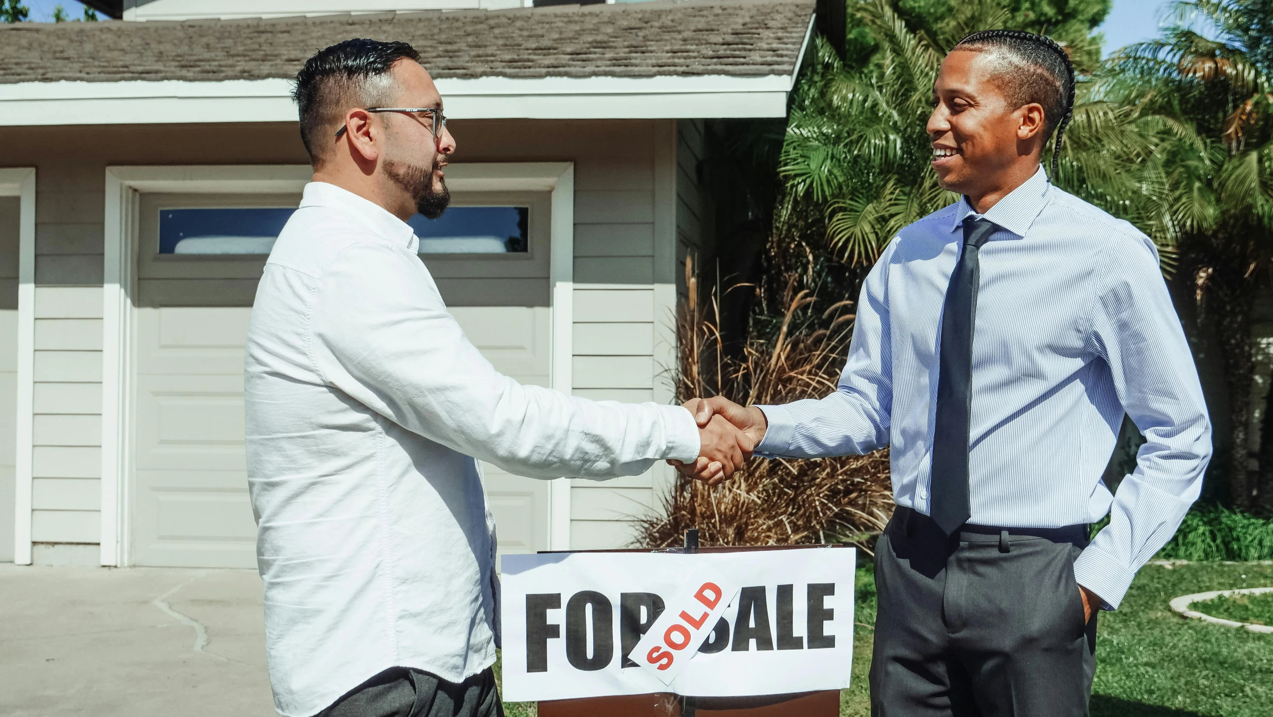 two men shaking hands in front of a for sale sign, pexels contest winner, thumbnail, suburban home, avatar image, mohamed chahin