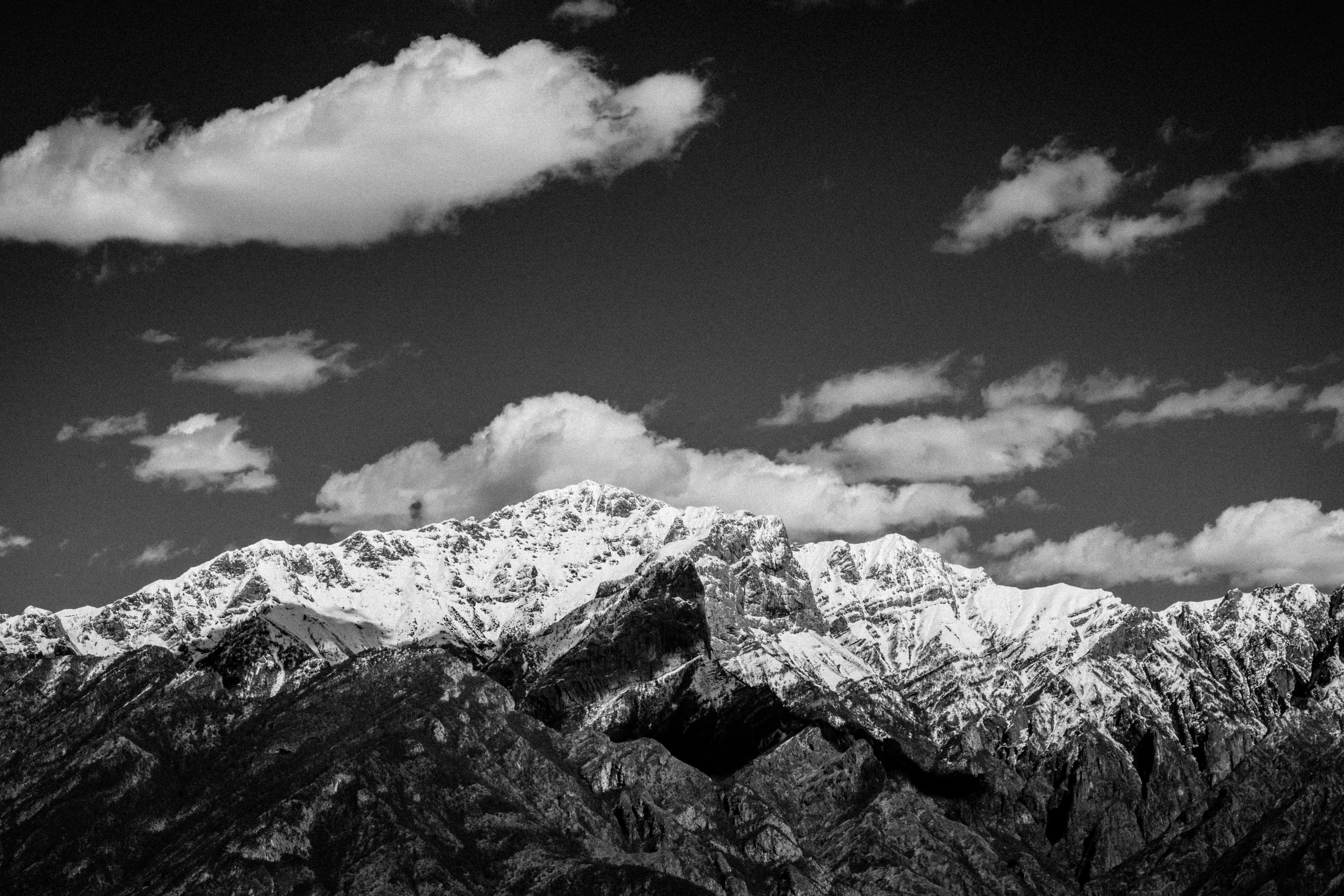 a black and white photo of a mountain range, unsplash, mount olympus, deep colours. ”, portrait!!!!, black and white color aesthetic