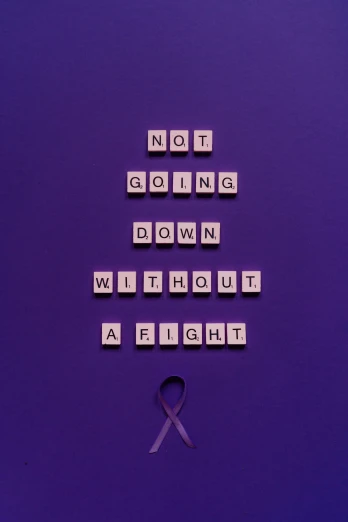 a purple poster with the words not going down without a fight, pexels contest winner, disease, pixelactivist, ribbon, - 12p