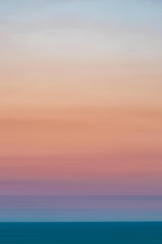 a large body of water with a sky in the background, a picture, unsplash, color field, in shades of peach, abstract photography, vertical wallpaper, evening sky