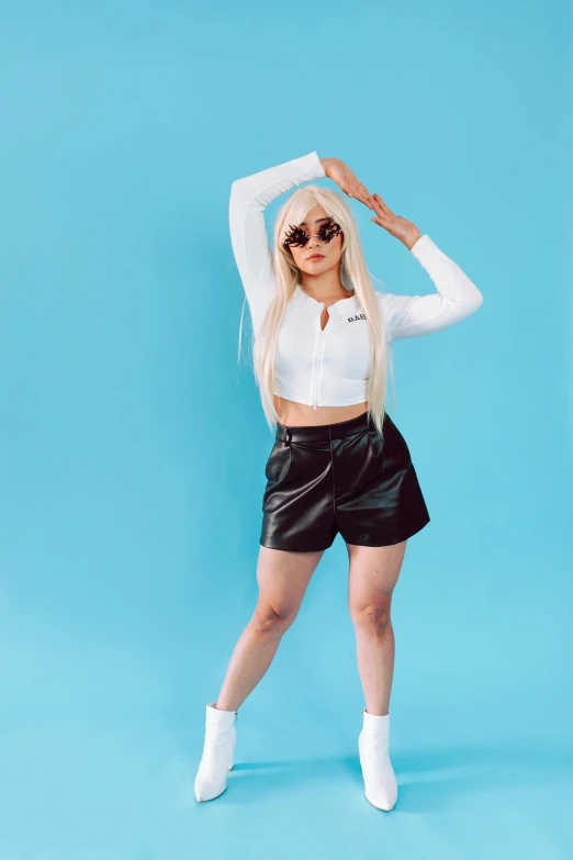 a woman in a white shirt and black leather shorts, an album cover, inspired by Ion Andreescu, trending on pexels, realism, white haired, t pose, trending on r/streetwear, bright sky