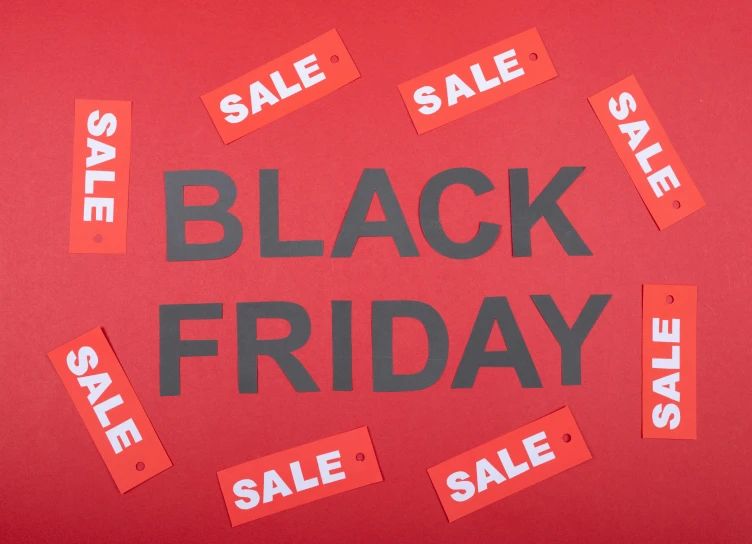 a sign that says black friday on a red background, a photo, by Julia Pishtar, shutterstock, hurufiyya, instagram picture, various posed, taken from the high street, ad image