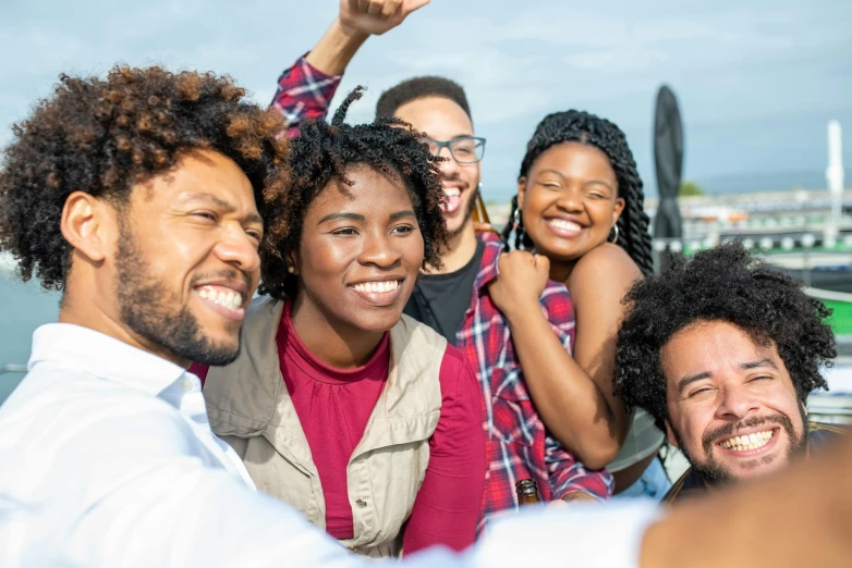 a group of people taking a selfie on a boat, pexels contest winner, happening, afroamerican, avatar image, high resolution image, college