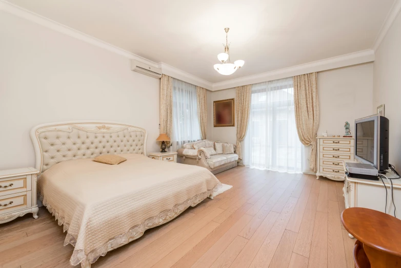 a bed room with a neatly made bed and a flat screen tv, a portrait, by Alexander Fedosav, shutterstock, art nouveau, light beige pillows, oak parquet, 2 5 6 x 2 5 6, knyazev konstantin