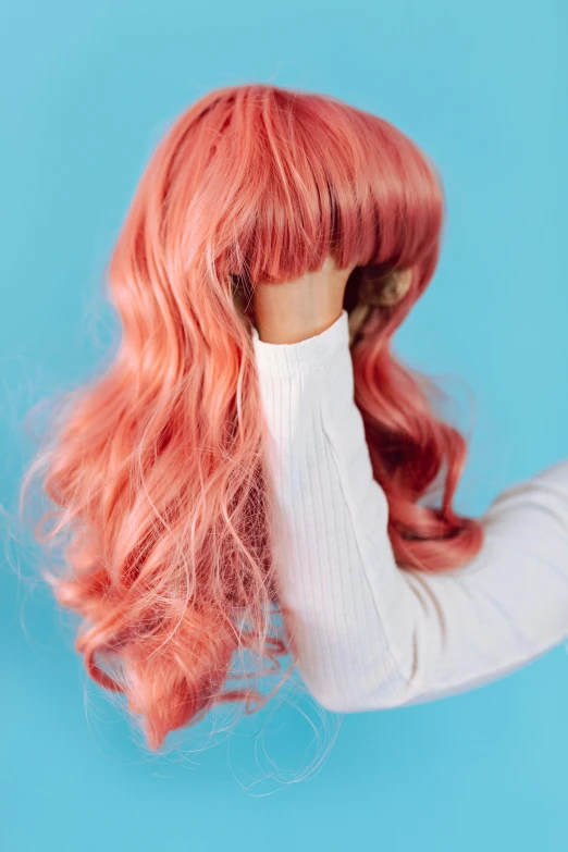 a woman with pink hair covering her face, trending on pexels, renaissance, bangs and wavy hair, coral, flat colour, wig