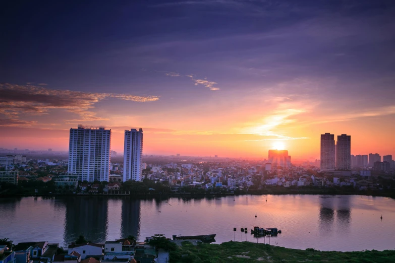 a large body of water surrounded by tall buildings, pexels contest winner, dang my linh, sun rise, slide show, wide river and lake