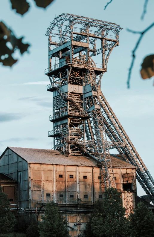 a large tower sitting in the middle of a field, intricate mine, elstree, up-close, photoshoot