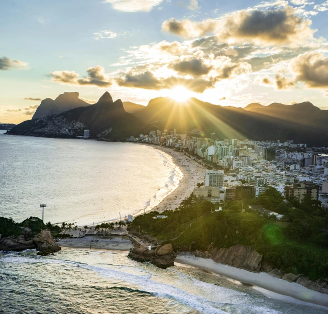 a large body of water next to a beach, by Felipe Seade, pexels contest winner, rio de janeiro in an anime film, evening sunlight, flatlay, herzog de meuron