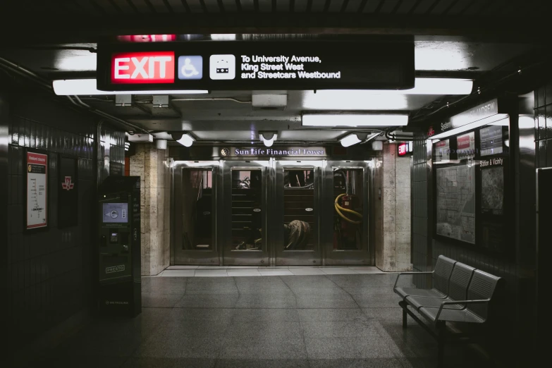 a black and white photo of a subway station, unsplash contest winner, excessivism, mta subway entrance, dark and beige atmosphere, promo image, 2000s photo