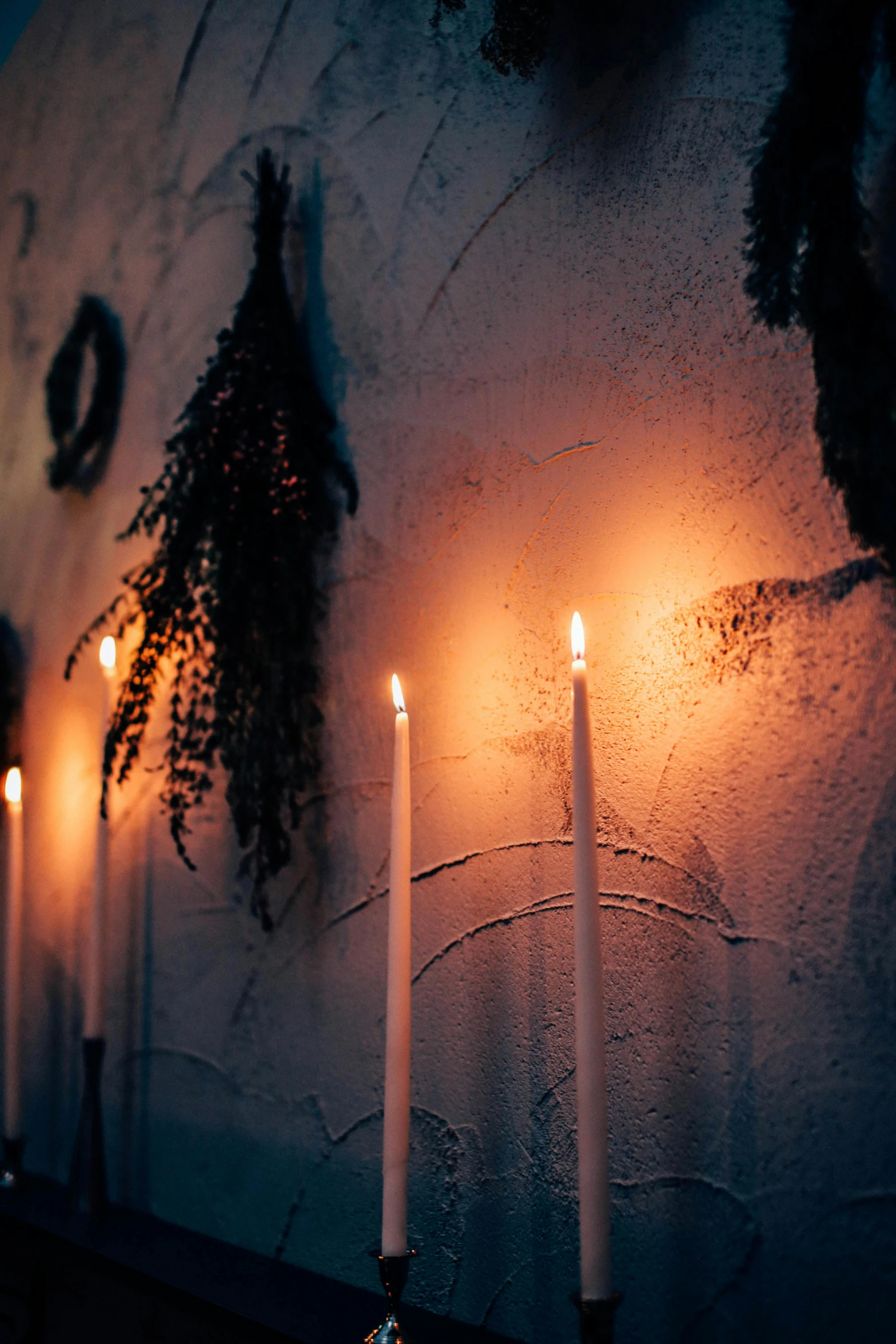 a group of candles sitting on top of a table, profile image