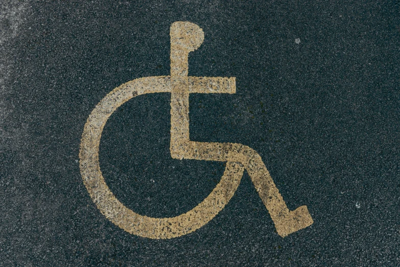 a handicap sign painted on the side of a road, an album cover, unsplash, hurufiyya, square, paul barson, gold, stephen hawking