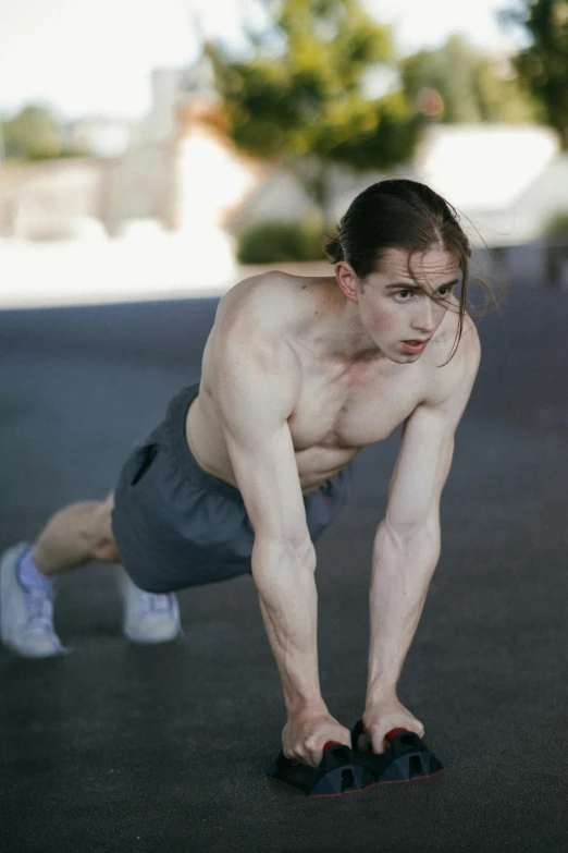 a man is doing push ups on a skateboard, by Ryan Pancoast, pexels contest winner, hyperrealism, very pale skin, wearing a tanktop, non binary model, in front of a garage