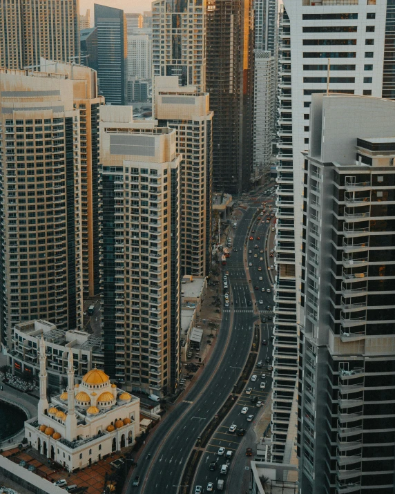 a view of a city from the top of a building, a screenshot, pexels contest winner, dubai, detailed street, highrise buildings, photo for magazine