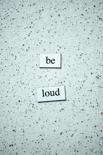 two pieces of paper with the words be loud on them, inspired by Louise Bourgeois, trending on pexels, magnetic, - 9, squad, white noise
