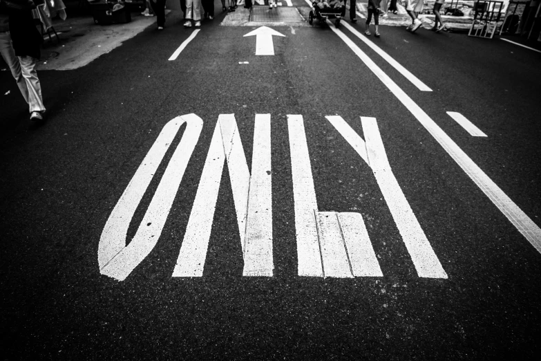 a black and white photo of a one way street, by Daniel Gelon, street art, \'obey\', offset photography, emily rajtkowski, so come on
