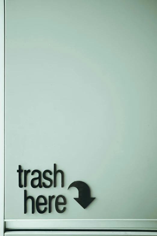 a trash can with a trash here sign on it, inspired by Ivan Trush, lacquered glass, promo image, frosted glass, ::