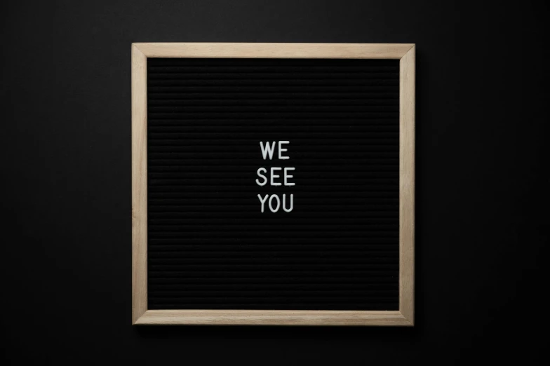 a letter board with we see you written on it, a picture, trending on unsplash, visual art, panel of black, 1024x1024, wooden, large format picture